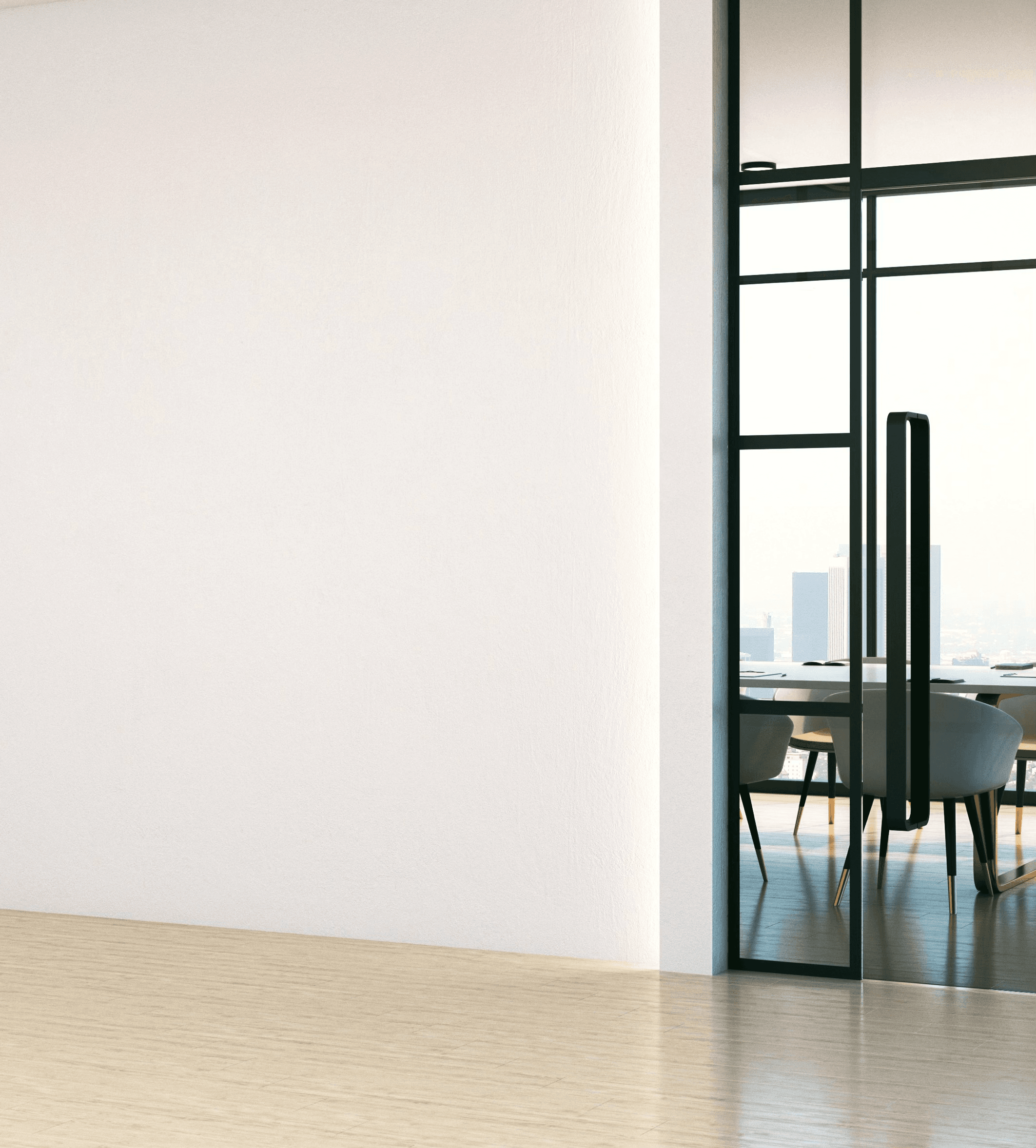 A modern meeting room seen through a glass office door